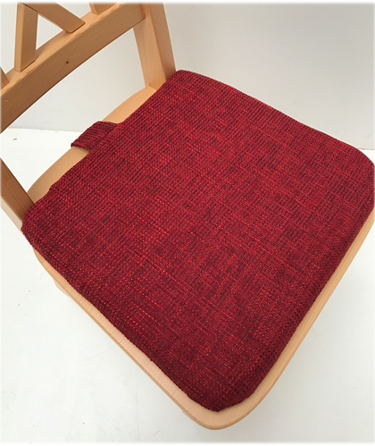 Stuhlkissen genäht, mit 1 Lasche und Wendedruckknopf, in 38 Lagerstoffen preisgleich