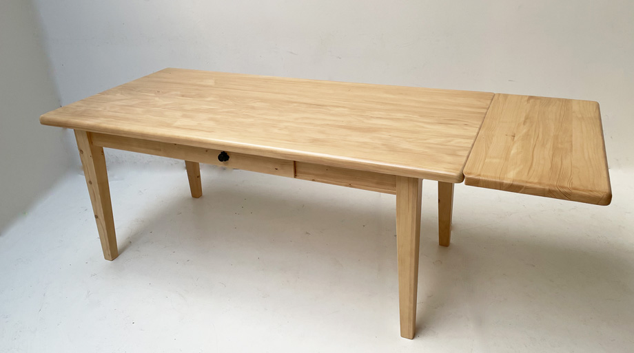 Vierfußtisch Nürnberg 90/180 Fichte mit Schubladen, 1 Ansteckplatte 40 cm , mit Konterprofil